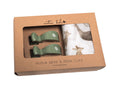 Muslin wrap and pram clips set in packaging with 'Emotion & Kids' branding.