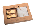 Muslin wrap and pram clips set in packaging with 'Emotion & Kids' branding.