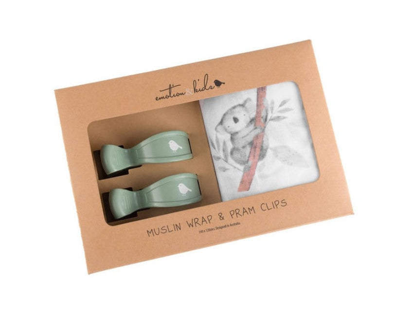 Muslin wrap and pram clips set in packaging with 'Emotion & Kids' branding.