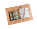 Muslin wrap and pram clips set in packaging with 'Emotion & Kids' branding.