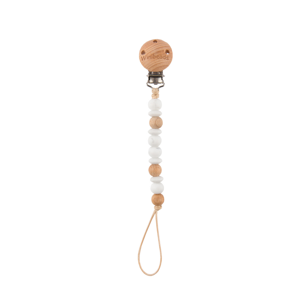 Pacifier clip with wooden beads on a white background